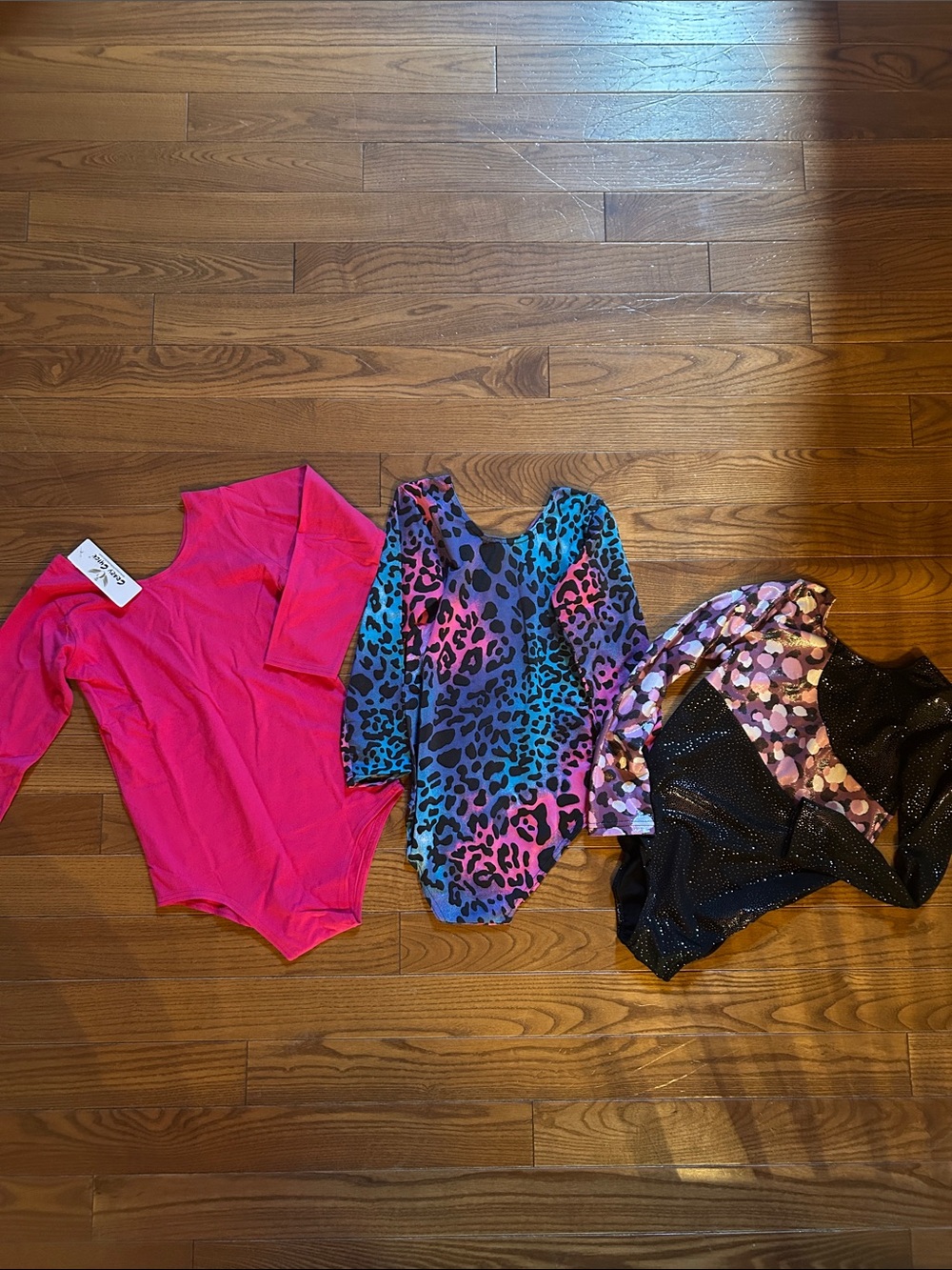 Bundle of 3 long sleeve gymnastics leotards